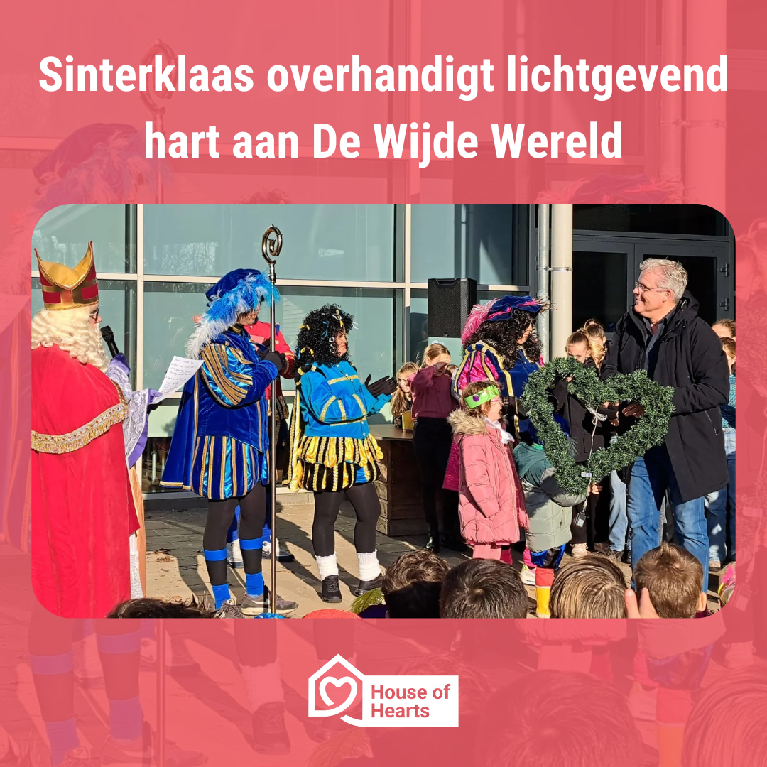 Udens Weekblad: Sinterklaas overhandigt lichtgevend hart aan De Wijde Wereld